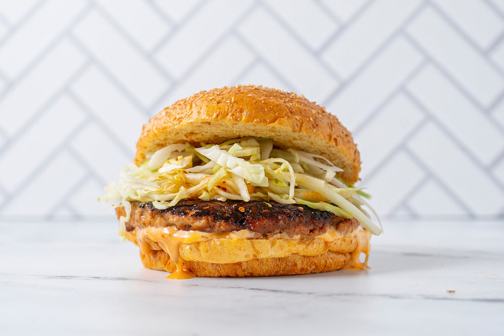 Teriyaki Chicken Burger with Chili Crunch White Sauce – Momofuku Goods