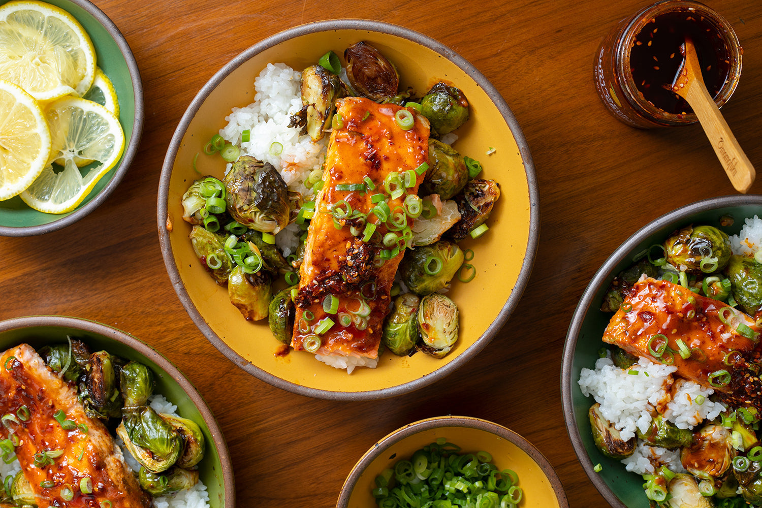 Tangy Chili Salmon Rice Bowls with Roasted Brussels Sprouts