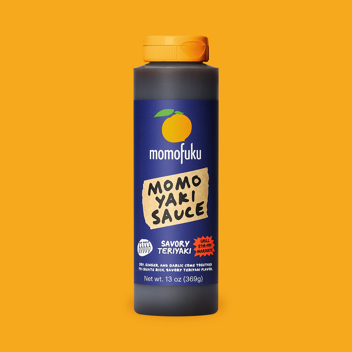 A bottle of Momofuku Momo Yaki Sauce on a solid orange background. The bottle is dark gray with a bright orange cap and a navy blue label featuring a yellow-orange graphic and a beige sticker that reads 'MOMO YAKI SAUCE'.