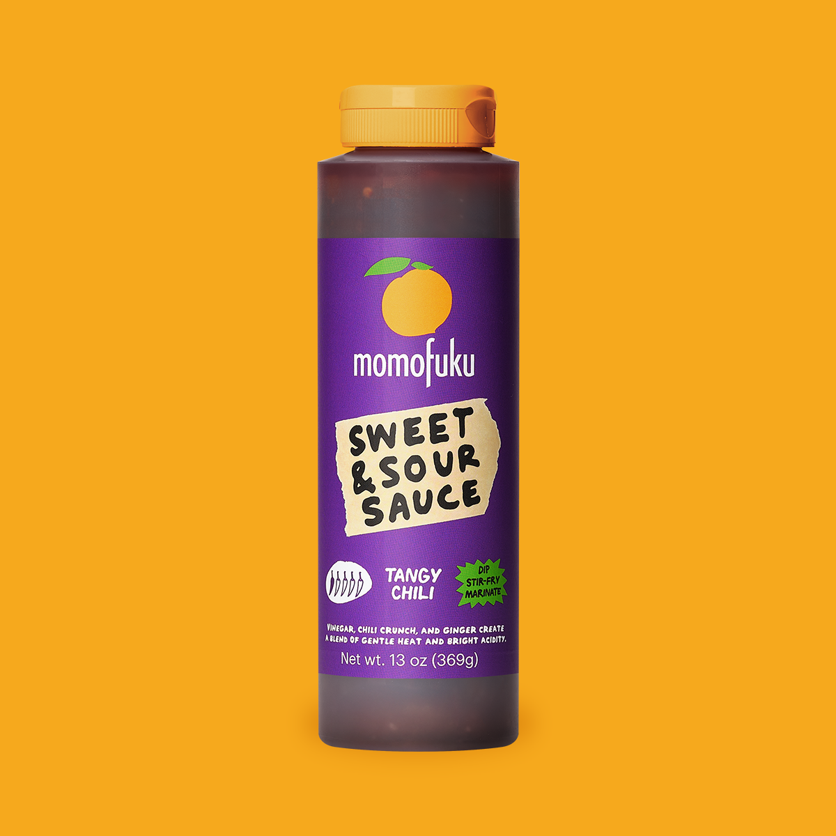 A bottle of Momofuku Sweet & Sour Sauce in the Tangy Chili flavor, featuring a purple label with a cartoon chili pepper and a yellow cap, set against a solid orange background.