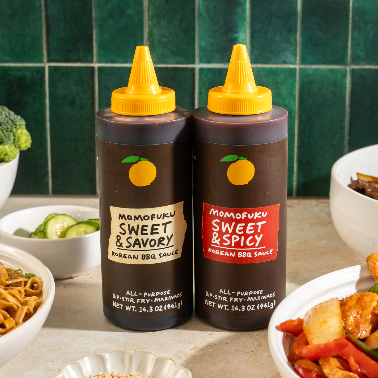 A bottle of Sweet & Savory BBQ Sauce and a bottle of Sweet & Spicy BBQ Sauce