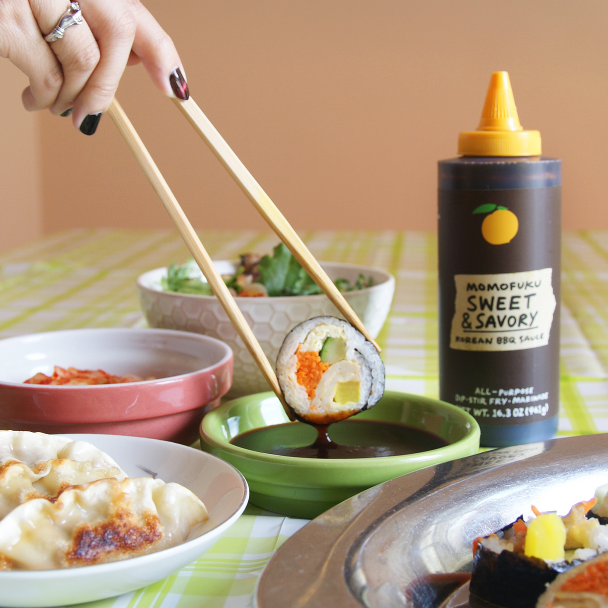 Sweet & Savory BBQ Sauce bottle with sushi