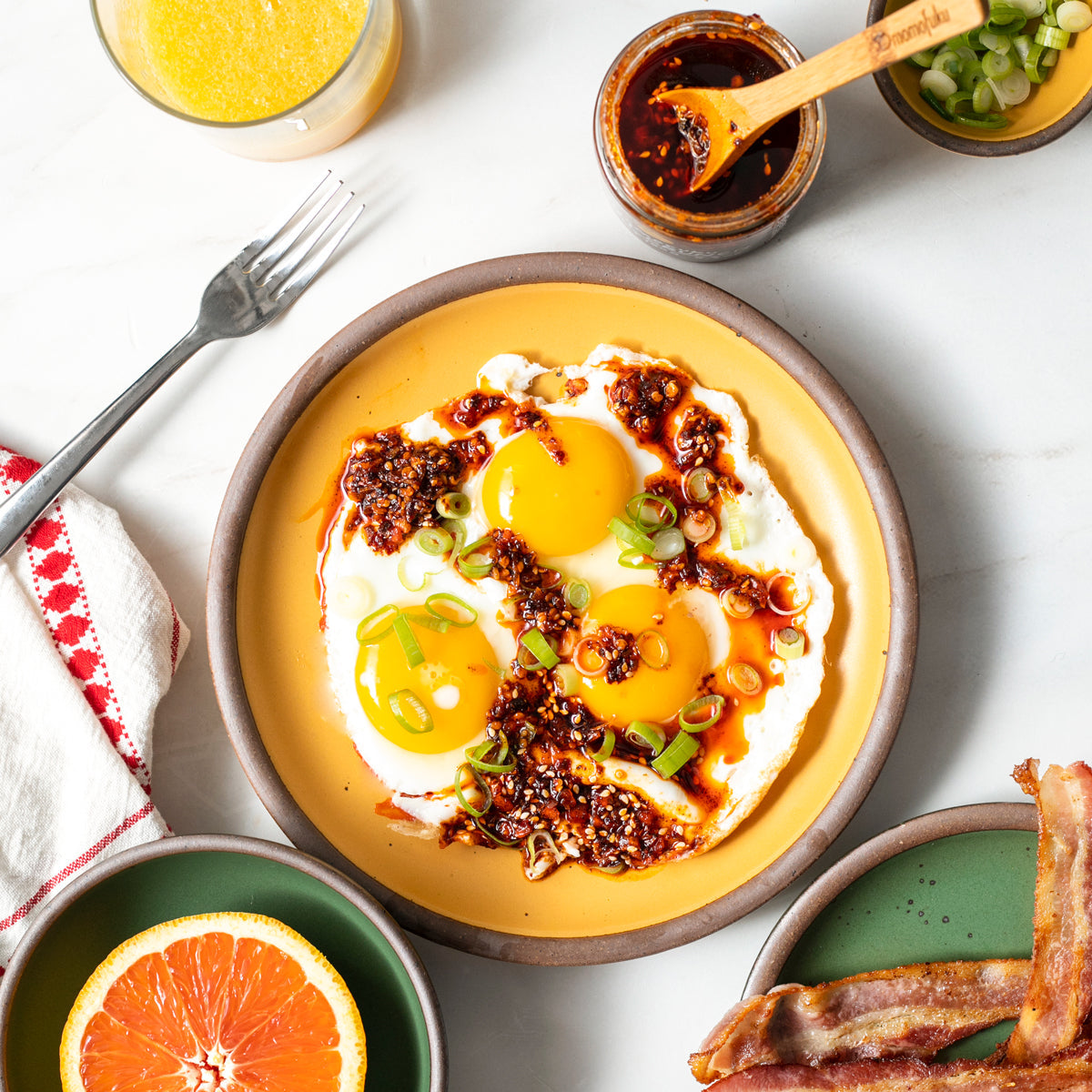 https://shop.momofuku.com/cdn/shop/files/Chili-Crunch-Eggs-3_47a9362d-6c86-4e55-8a21-c35e2d333283.jpg?v=1691701808