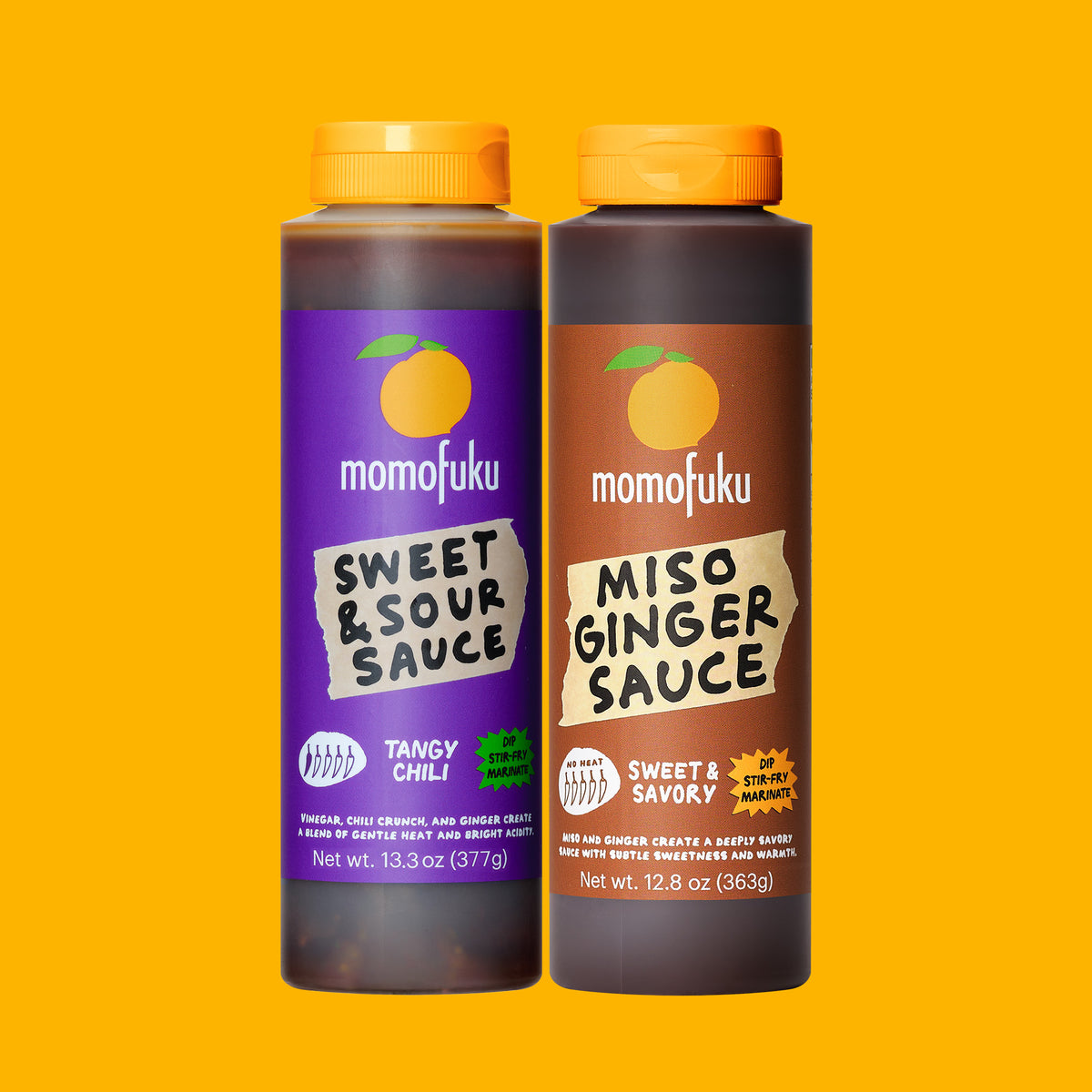 Two bottles of momofuku sauce on a solid yellow background. The left bottle is Sweet & Sour Sauce in the Tangy Chili flavor with a purple label.