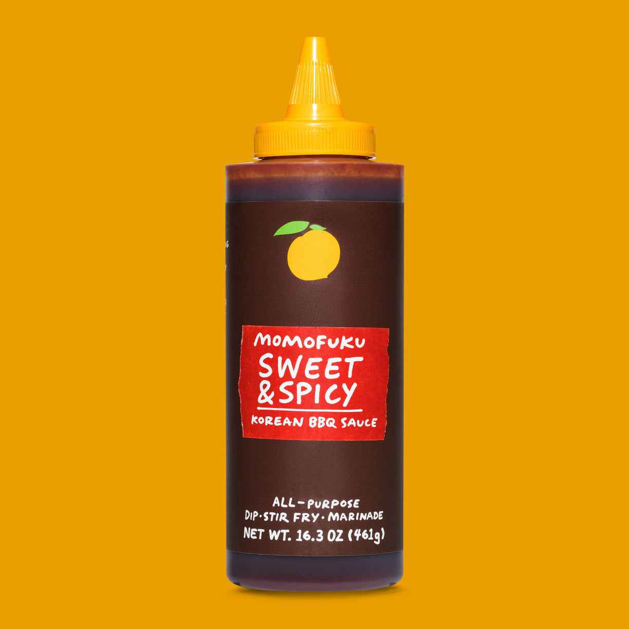 Bottle of Sweet & Spicy Korean BBQ Sauce on Orange Background